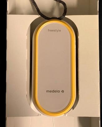 tiralatte Medela Freestyle 