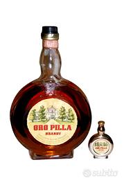 VECCHIA BOTTIGLIA ORO PILLA +MIGNON ANNI 60