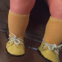 Scarpe e calze per bambolotti