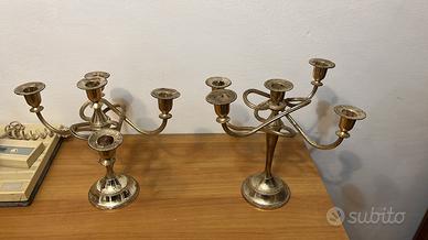 Due candelabri vintage in zinco placcate argento