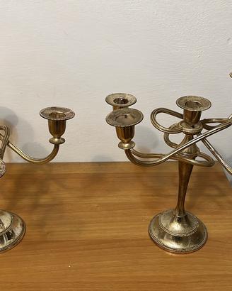Due candelabri vintage in zinco placcate argento
