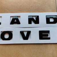 Scritta LAND ROVER in rilievo nero lucido