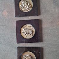 medaglie raffiguranti stagioni opera Minguzzi