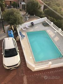 Attico trilocale vista mare piscina auto moto bici