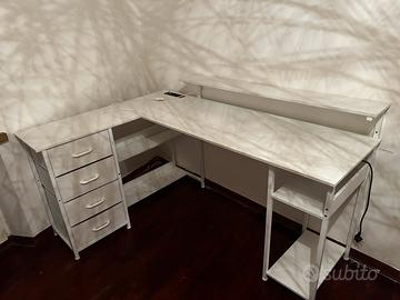 scrivania ad angolo con luci a led e cassetti