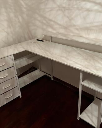scrivania ad angolo con luci a led e cassetti