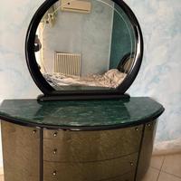 Arredamento camera da letto.