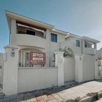 Rifinito appartamento con giardino e due verande