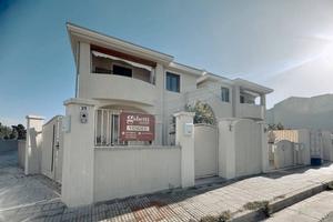 Rifinito appartamento con giardino e due verande