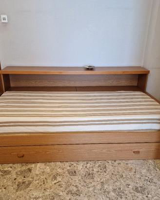 Letto singolo con mobile portacuscini