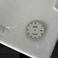 Quadrante Rolex con numeri in oro