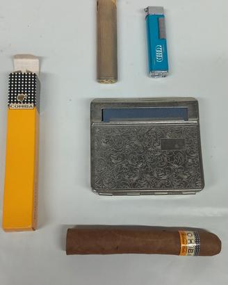 accendino geneve, rollatore bonfil , sigaro cohiba