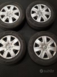 4 cerchi in ferro con gomme e copricerchi Vw polo