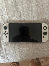 Nintendo switch oled,base di ricarica e 2 joycon