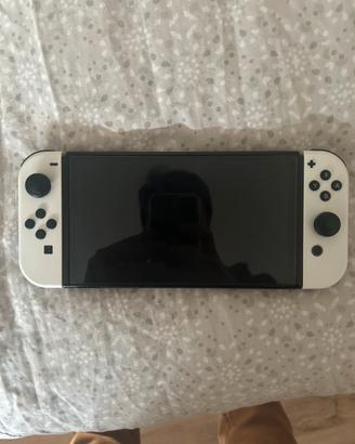 Nintendo switch oled,base di ricarica e 2 joycon