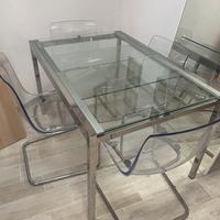 Tavolo allungabile in cristallo con sedie