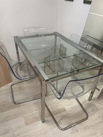Tavolo allungabile in cristallo con sedie