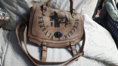 Borsa beige rosa in vera pelle con scritte davanti