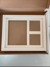Cornice,impronte bambino design moderno