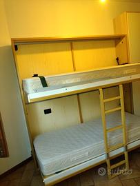 letto a castello a scomparsa e colonna anta omag
