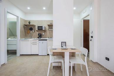 Bilocale in parco con parcheggio e balconi