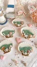Candele in conchiglie di capesante