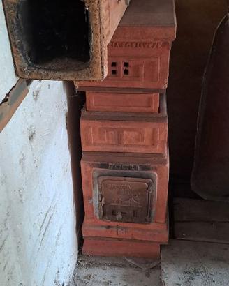 stufa a legna per casa di campagna