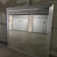 Specchio a cornice ondulato