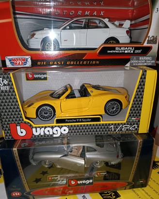 LOTTO DI 3 MODELLINI PORSCHE SUBARU SCALA 124