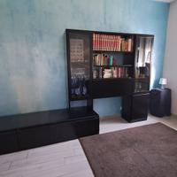 Libreria con penisola porta TV
