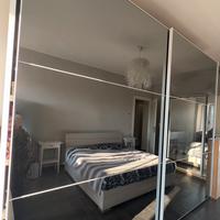 Armadio ante scorrevoli a specchio fumè