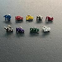 Set 9 orecchini con scritte colorate metallo NUOVI