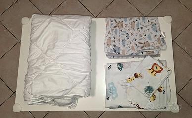 Piumino + 2 set copripiumino per culla/lettino