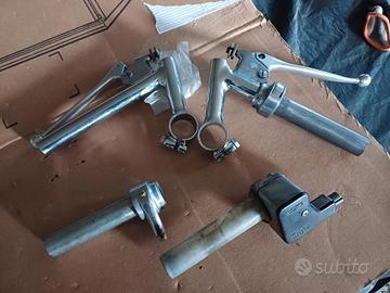Manubrio + Fanale post. + comandi gas