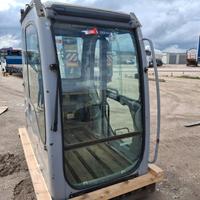 Ricambi cabina escavatore new holand