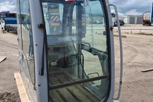 Ricambi cabina escavatore new holand