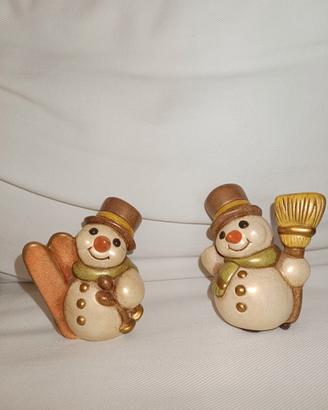 pupazzo di neve con gli sci thun