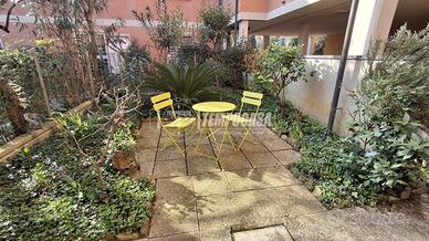 Villetta a schiera con giardino ed autorimessa