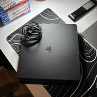PlayStation 4 + volante con pedali + 12 giochi