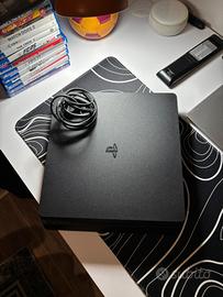 PlayStation 4 + volante con pedali + 12 giochi