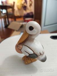 Statuetta Thun cicogna con fagotto