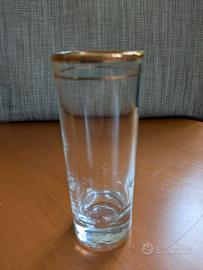 Set da 12 bicchieri alti in vetro con bordo dorato