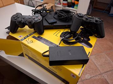 PlayStation 2 Slim Nera con scatola + accessori
