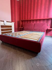 Letto con contenitore e testiera imbottita
