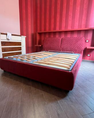 Letto con contenitore e testiera imbottita
