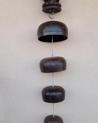 Campane tibetane in sospensione con scultura 