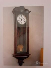 orologio a pendolo da muro