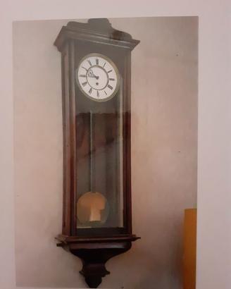 orologio a pendolo da muro