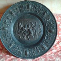 Piatto in rame in bassorilievo