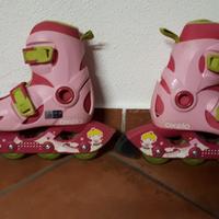 Roller Oxelo rosa con casco e protezioni